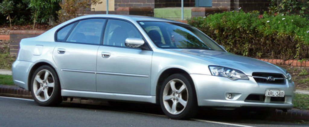 Subaru Legacy transported from MT to TX