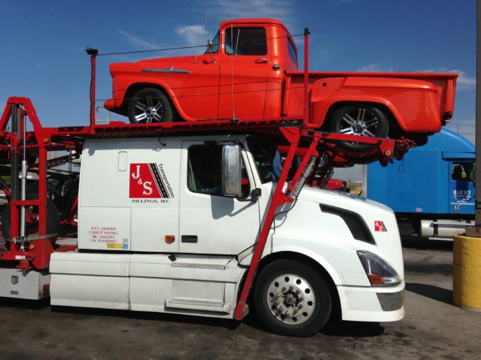 Loading and unloading an auto transport trailer