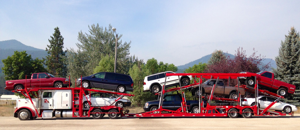 car hauling company truck and trailer