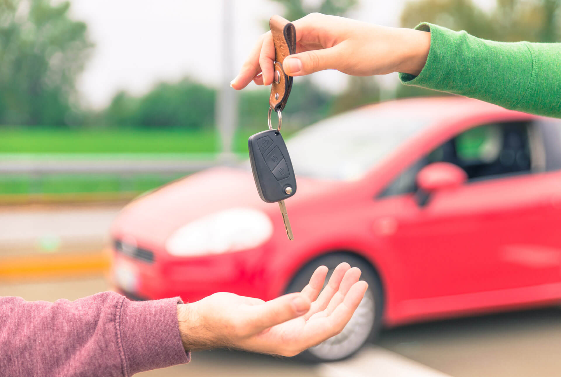 handing keys to driver at pick up and delivery